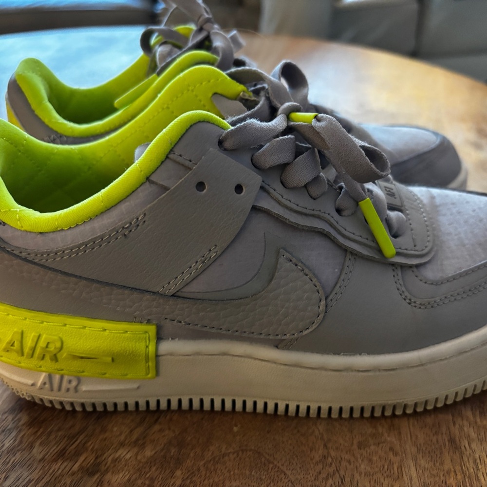 Barely worn Air Force max grey and neon yellow/green! Size 6 women’s!
